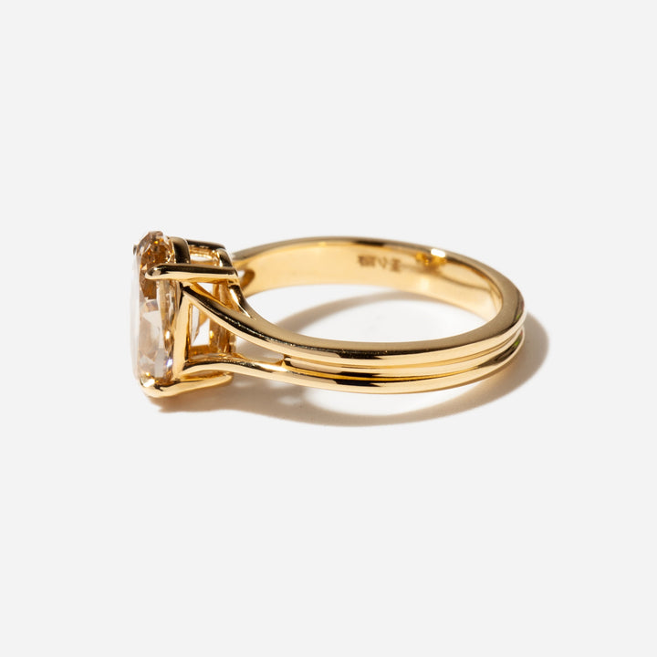 Side profile of a split shank lab grown diamond solitaire ring highlighting the elevated center stone setting