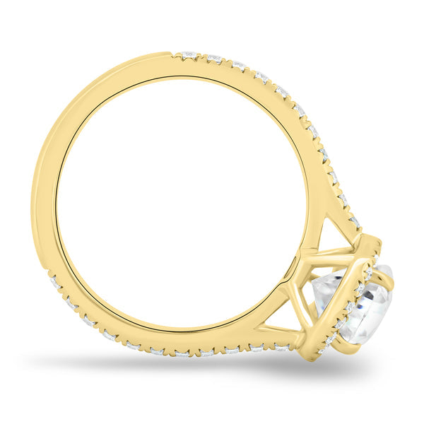 Pear cut lab diamond halo cathedral pavé engagement ring inspired by trending USA bridal jewelry styles