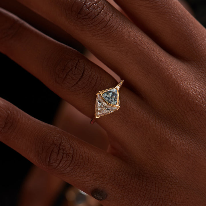 Trillion cut lab diamond and teal sapphire engagement ring designed for USA buyers seeking unique alternative bridal rings