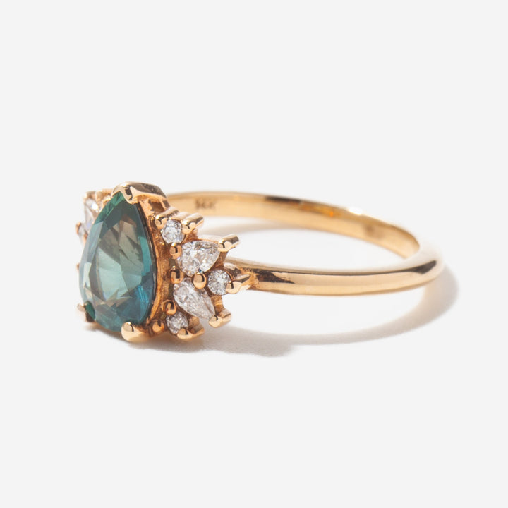 Pear sapphire cluster engagement ring with lab diamonds designed for USA bridal jewelry trends and modern style