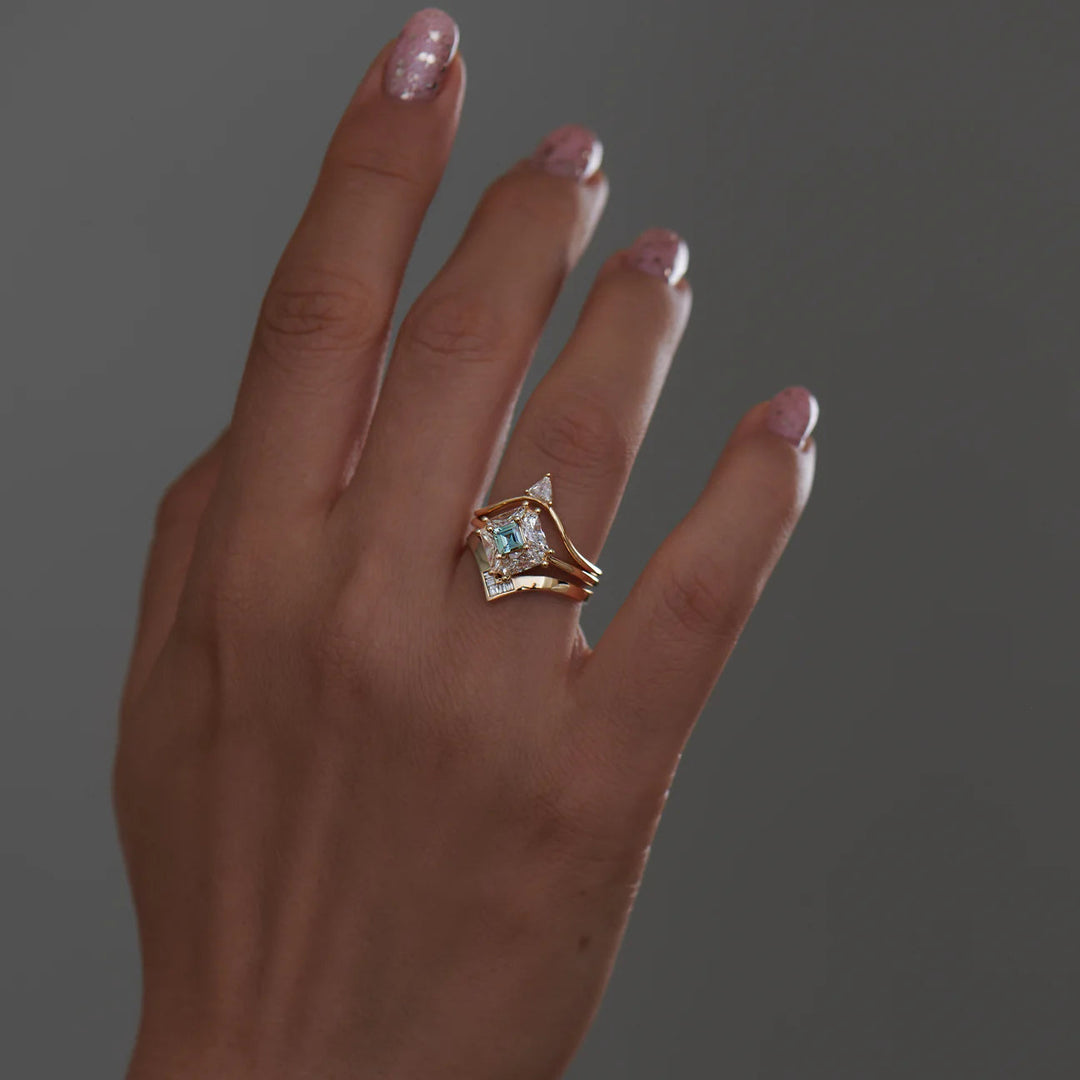 Half moon lab diamond engagement ring with teal sapphire designed for USA alternative bridal jewelry trends