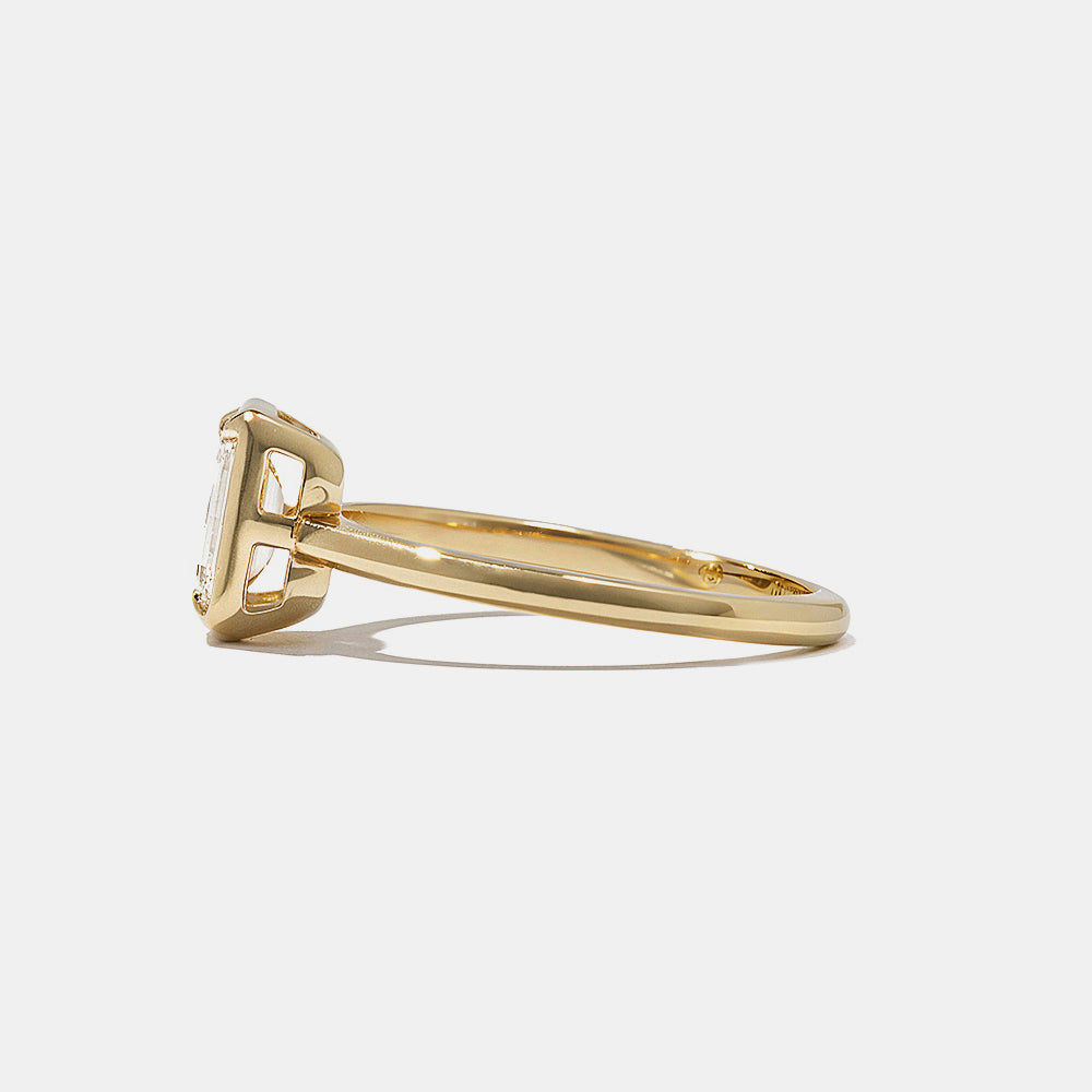 Oval lab grown diamond bezel engagement ring designed for USA bridal trends with modern minimal elegance