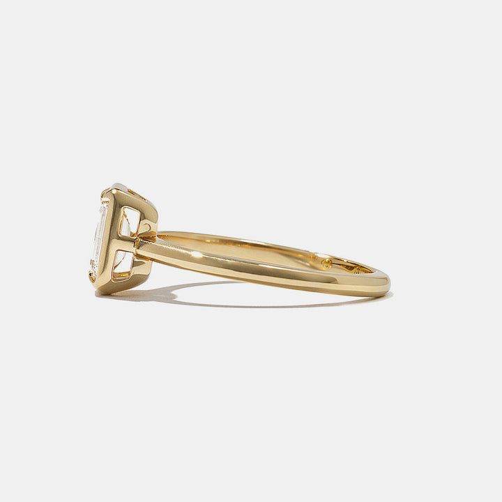 Oval lab grown diamond bezel engagement ring designed for USA bridal trends with modern minimal elegance