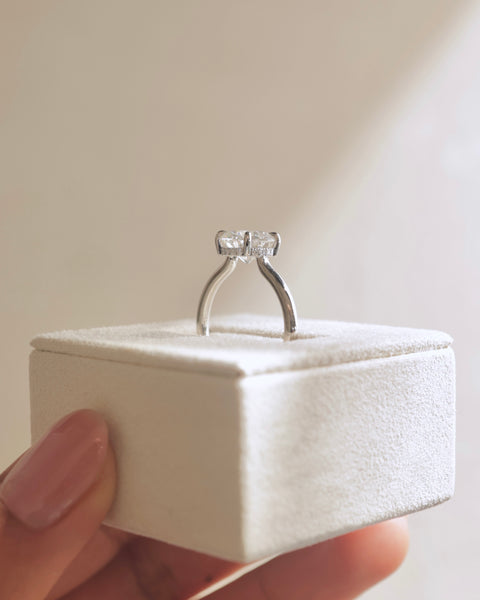 Round lab grown diamond hidden halo solitaire engagement ring inspired by popular USA bridal jewelry trends