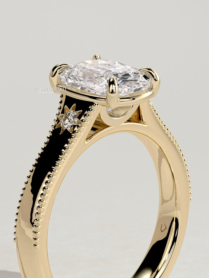 oval solitaire bezel set engagement ring
