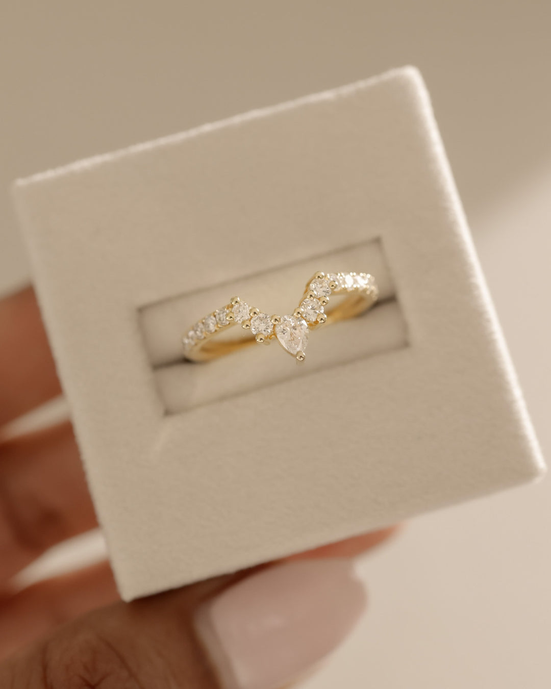 Wedding band for pear shaped engagement ring
