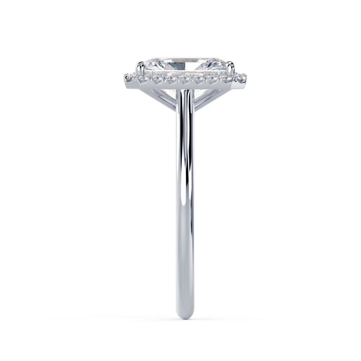 Modern radiant cut lab grown diamond halo solitaire engagement ring designed for contemporary bridal aesthetics