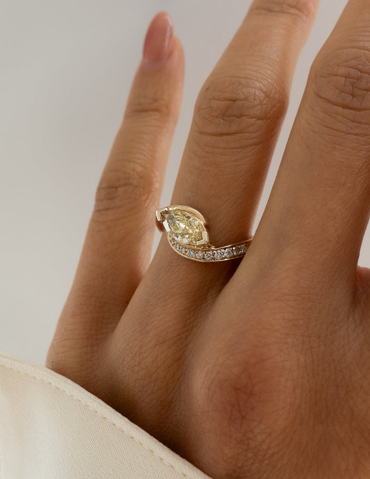 Discounted East-West diamond rings, Luxury East-West engagement rings, Unique East-West diamond rings.