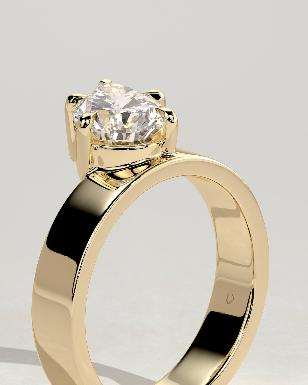angled pear solitaire ring
