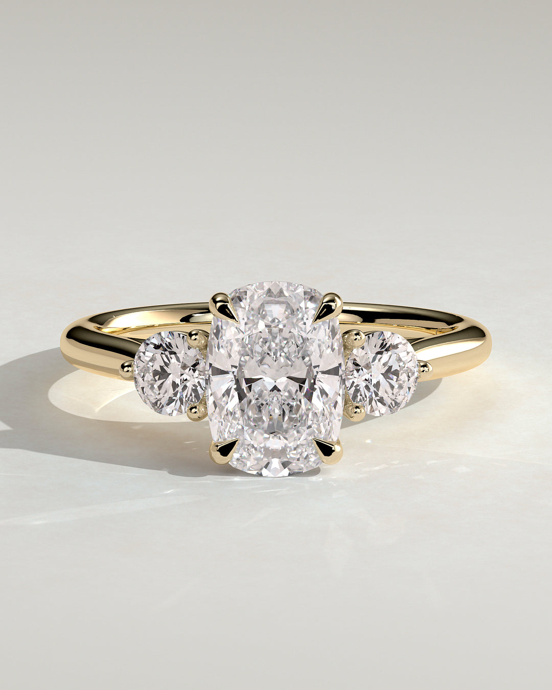 cushion 3 stone engagement ring