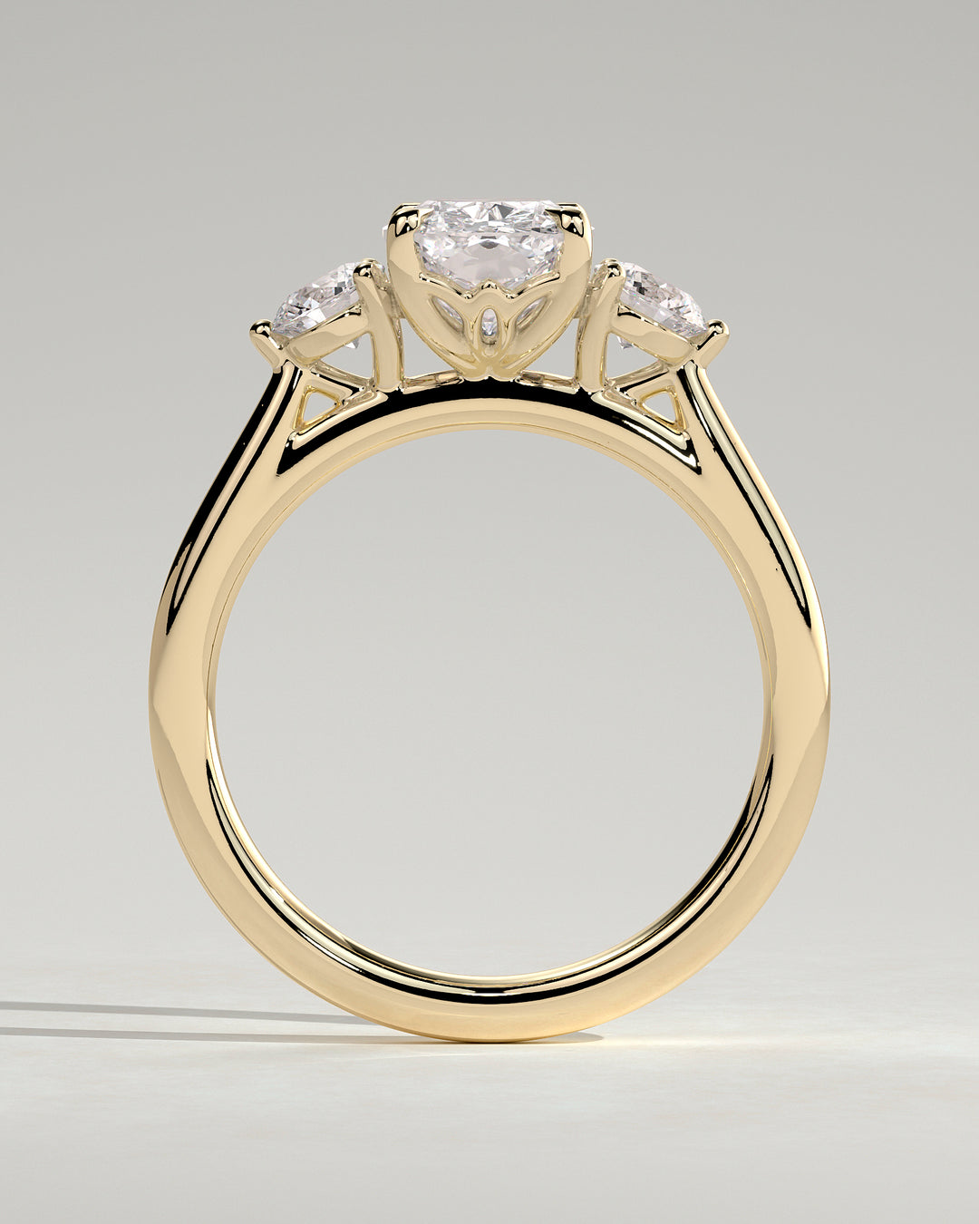 cushion diamond three stone ring