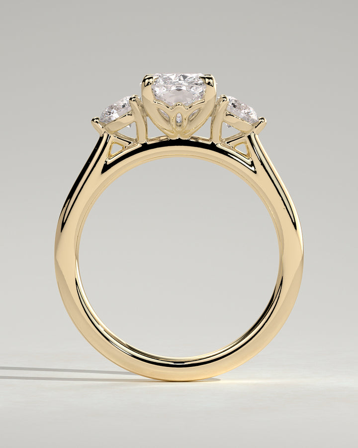 cushion diamond three stone ring