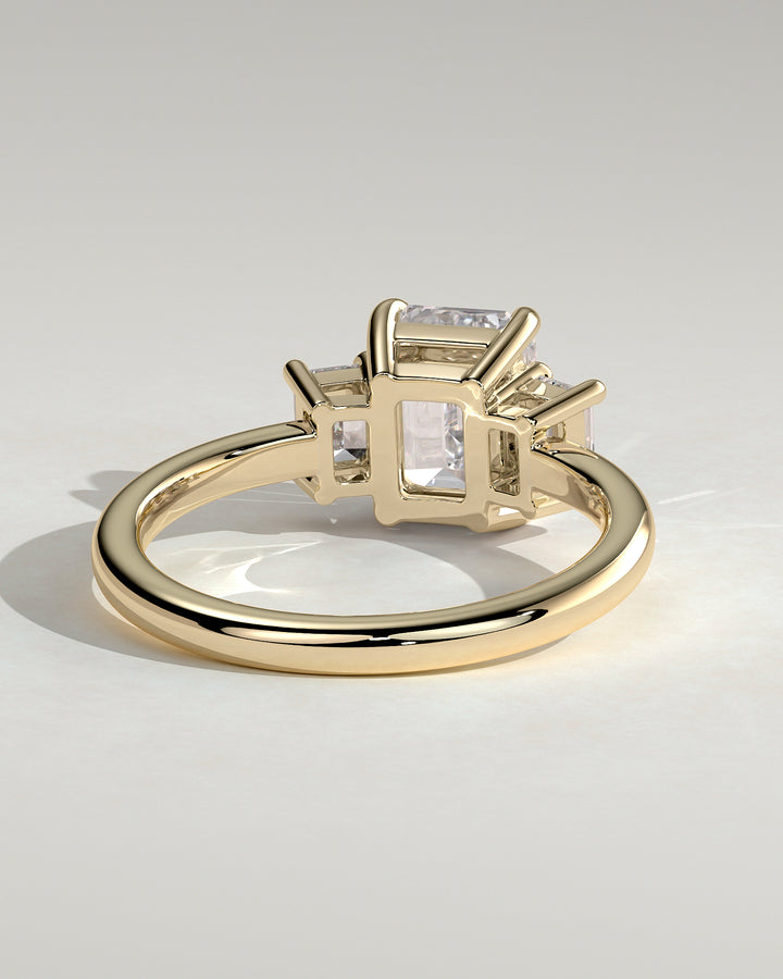 diamond ring with a lab-grown emerald