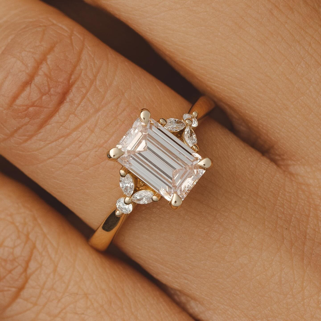 emerald cluster engagement ring
