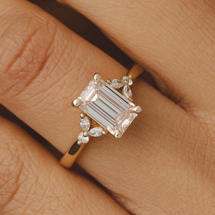 emerald cluster engagement ring
