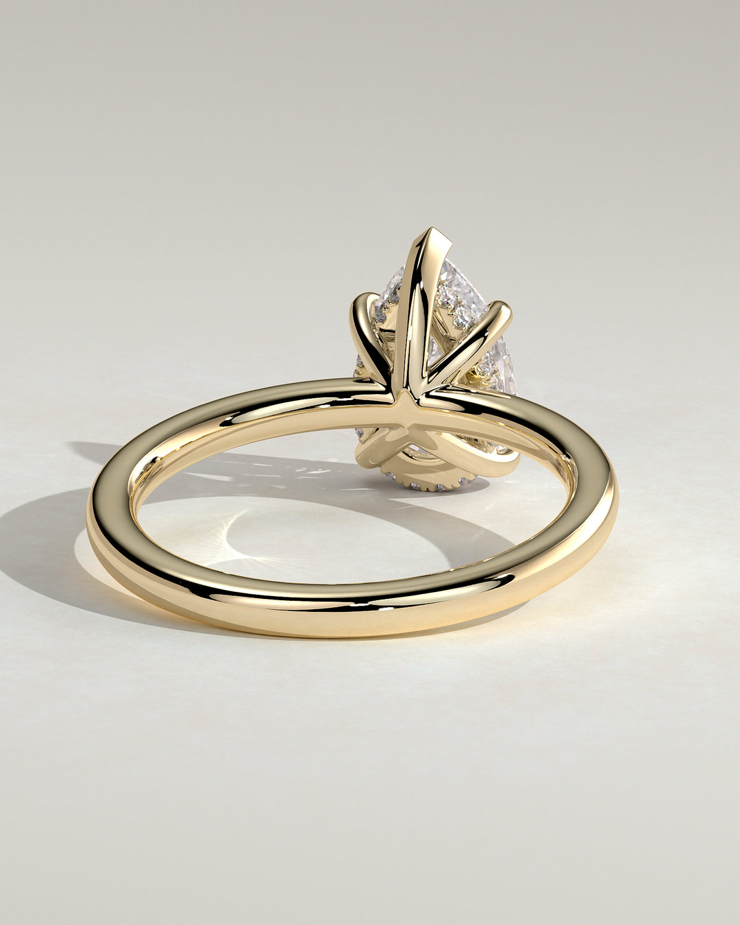 engagement ring pear hidden halo