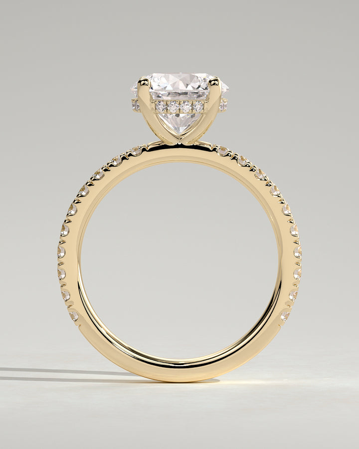 gold round solitaire engagement ring hidden halo