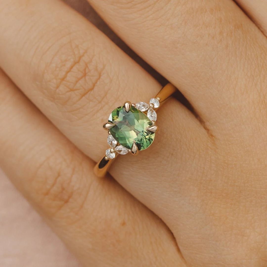 green oval cluster ring
