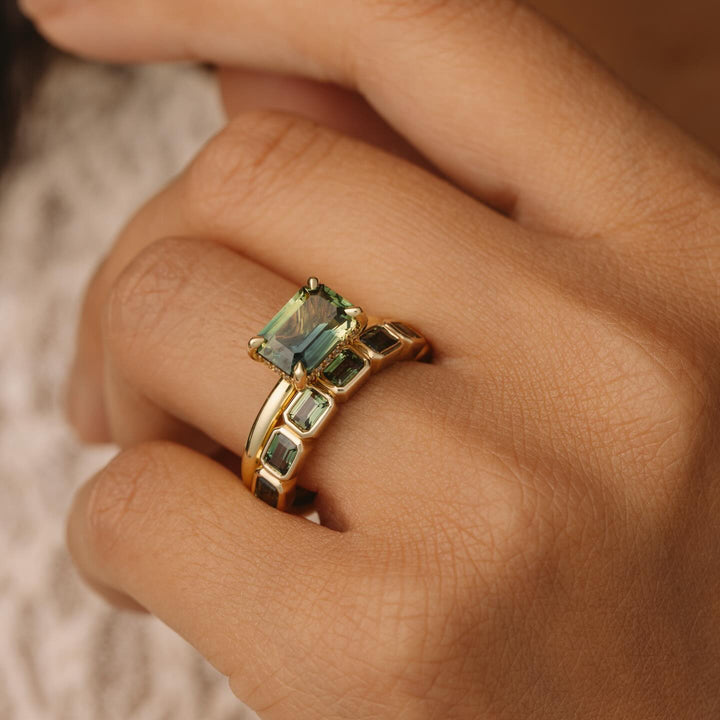 east west ring emerald 
