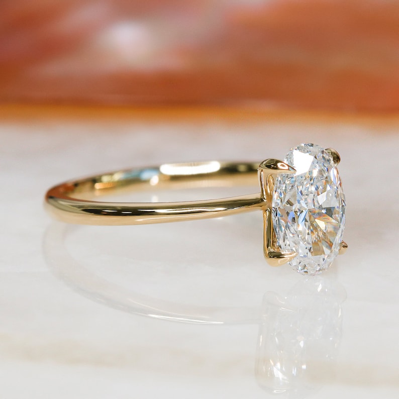 oval-solitaire-f-vs1-diamond-engagement-ring