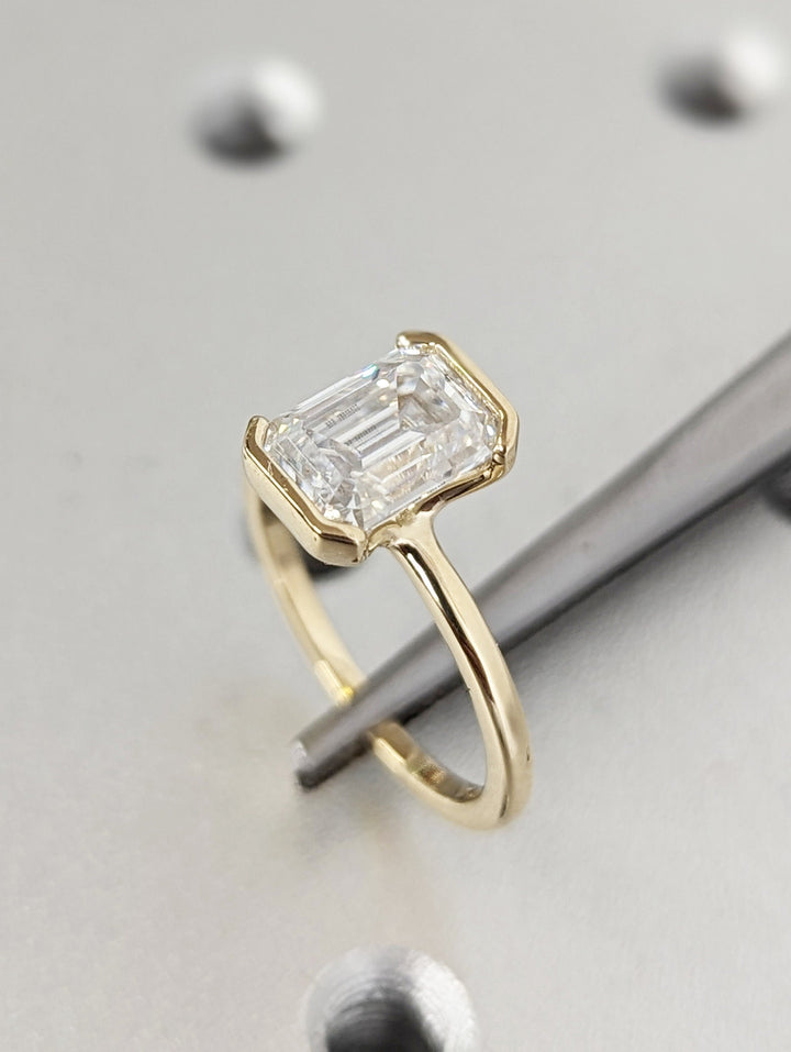 1.50CT Emerald Cut Half Bezel Set Lab Grown Diamond Engagement Ring For Women