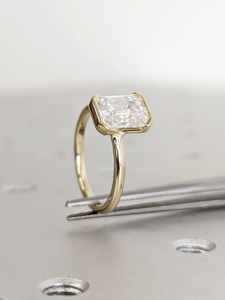1.50CT Emerald Cut Half Bezel Set Lab Grown Diamond Engagement Ring For Women