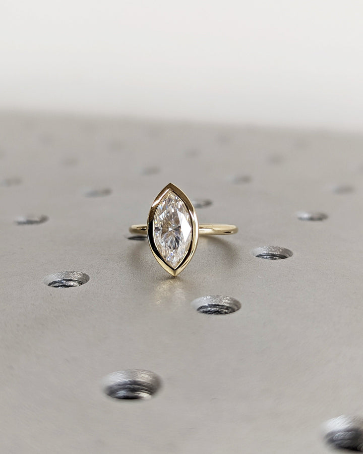1.50CT Marquise Cut Bezel Set Lab Grown Diamond Engagement Ring For Women