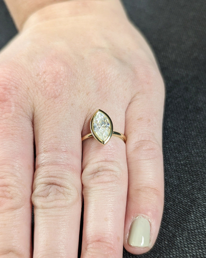 1.50CT Marquise Cut Bezel Set Lab Grown Diamond Engagement Ring For Women