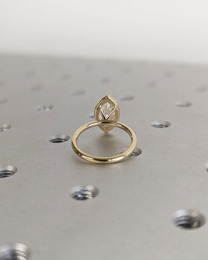 1.50CT Marquise Cut Bezel Set Lab Grown Diamond Engagement Ring For Women