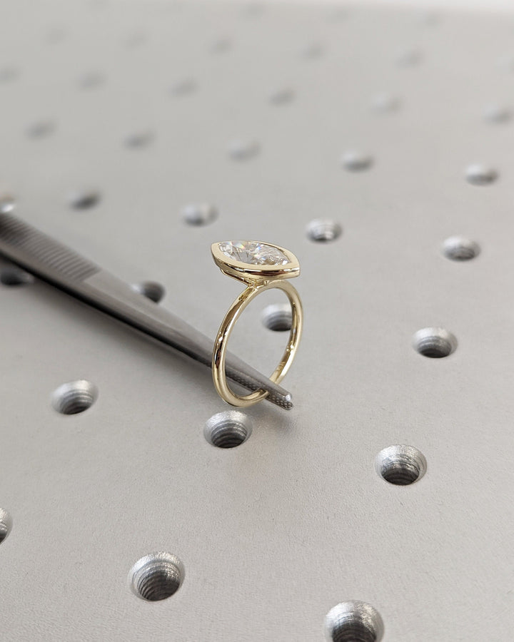 1.50CT Marquise Cut Bezel Set Lab Grown Diamond Engagement Ring For Women