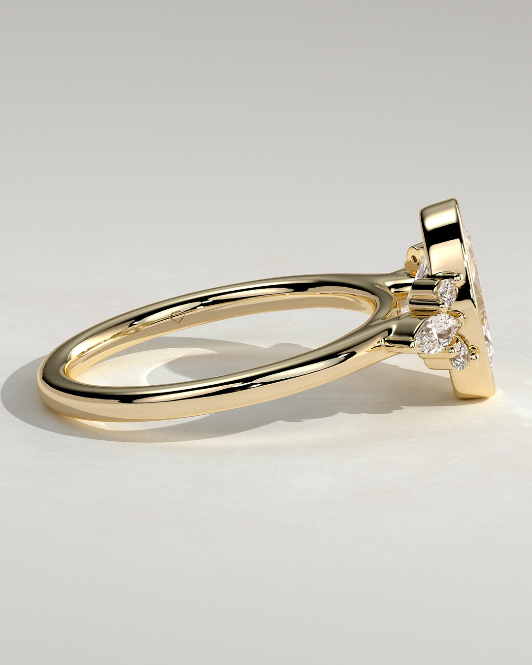 bezel cluster engagement ring oval