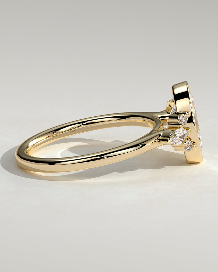 bezel cluster engagement ring oval