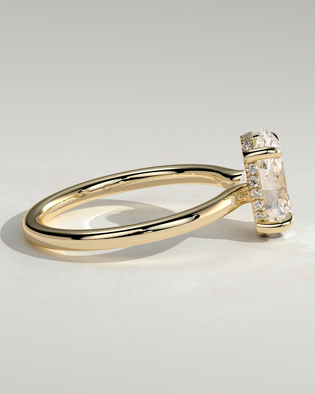 oval gold solitaire engagement ring hidden halo