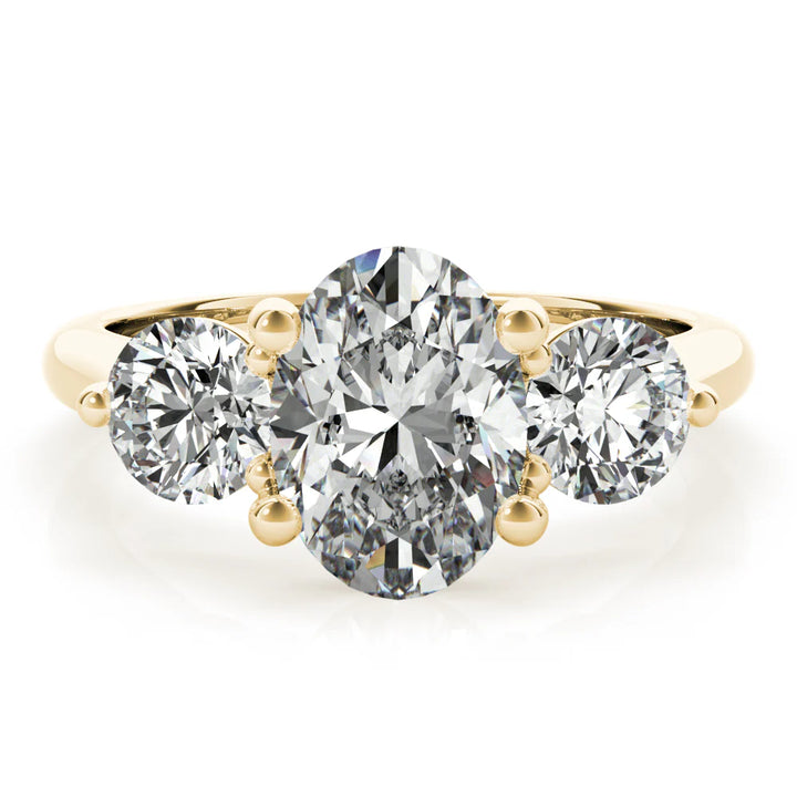 oval trilogy engagement ring
