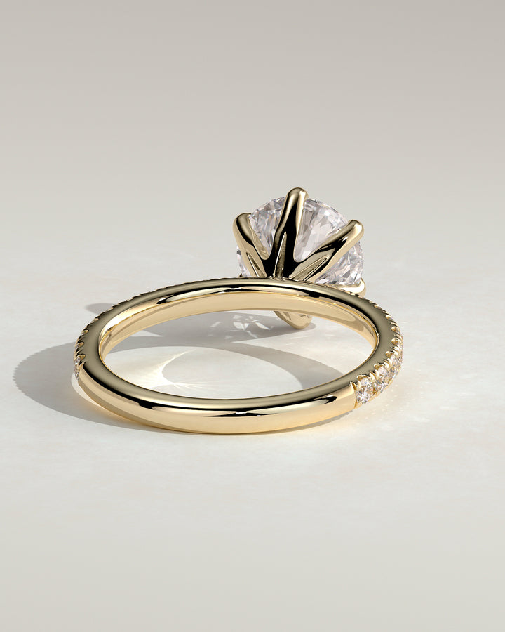 modern round engagement ring pave band