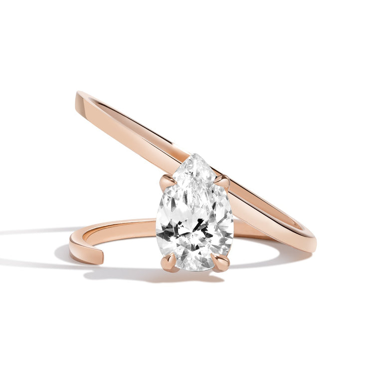 1.0ct Pear Cut Diamond Slant Unique Engagement Ring