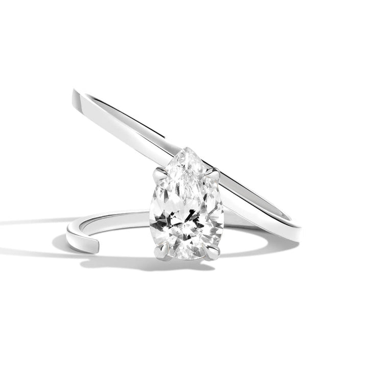 1.0ct Pear Cut Diamond Slant Unique Engagement Ring