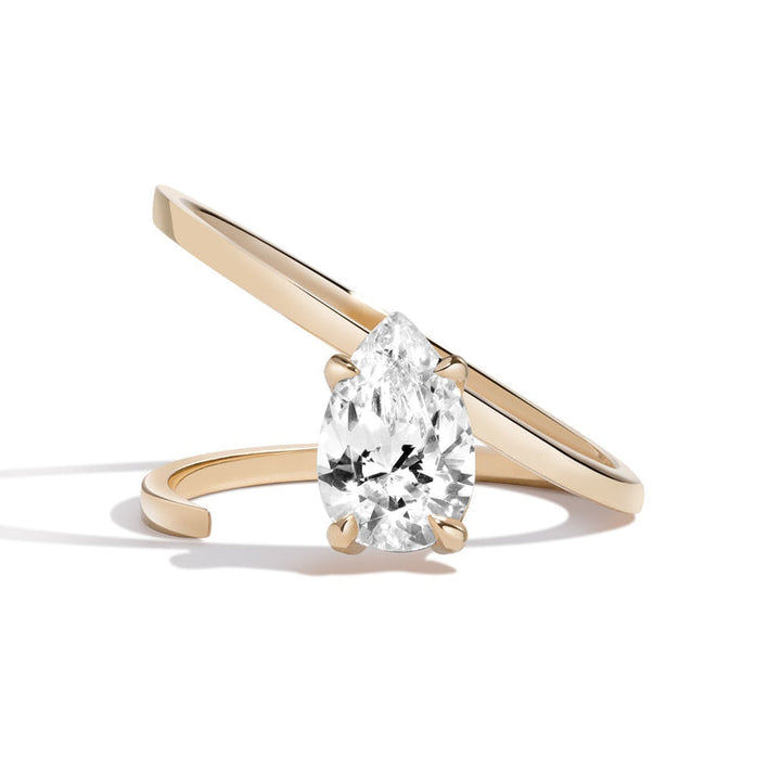 1.0ct Pear Cut Diamond Slant Unique Engagement Ring