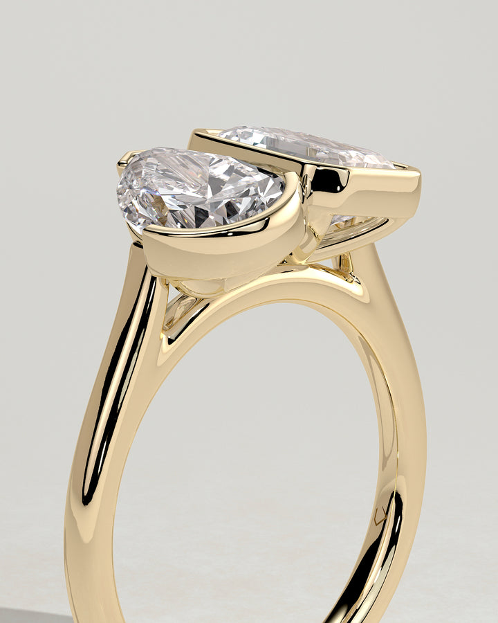 pear and emerald ring