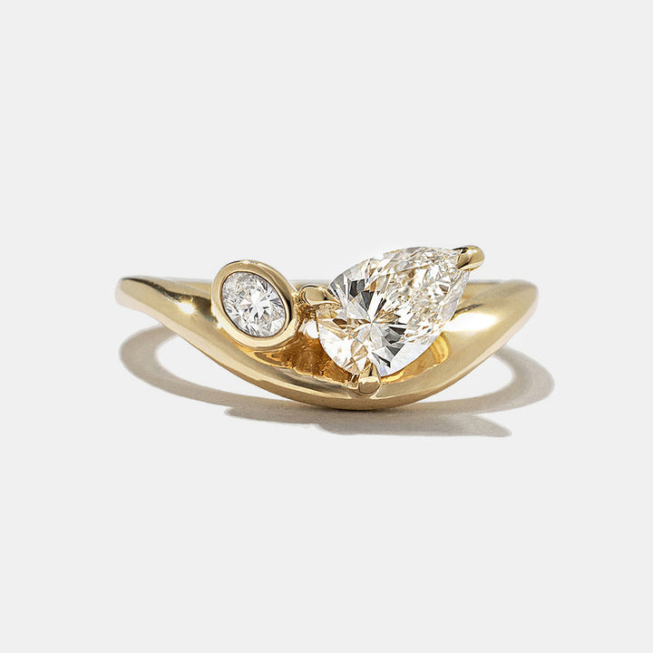 toi et moi pear oval lab grown diamond engagement ring bezel 0.7 carat