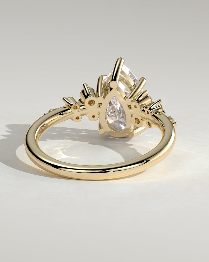 pear diamond cluster ring