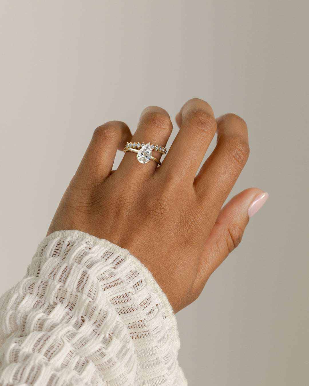 pear east west solitaire ring
