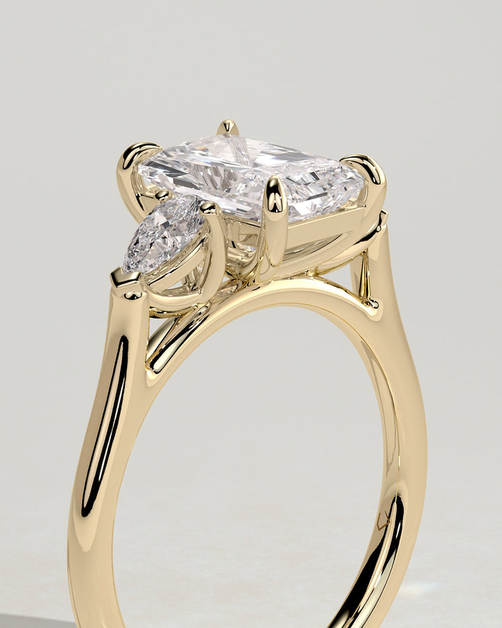 pear side stone engagement ring