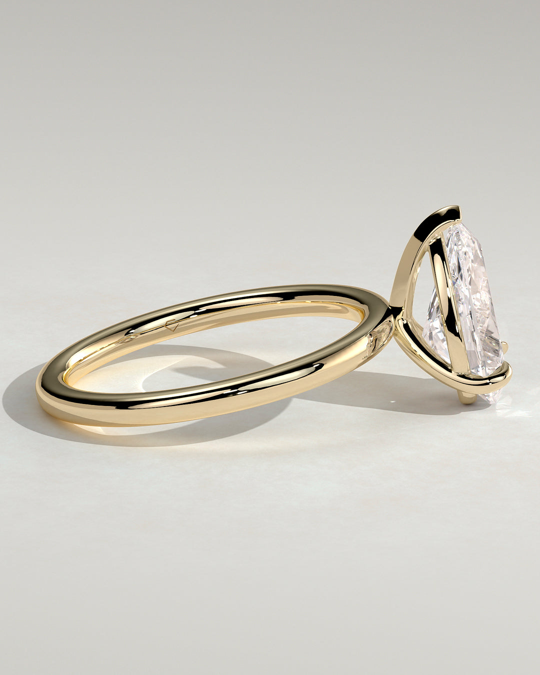 pear solitaire engagement ring gold band