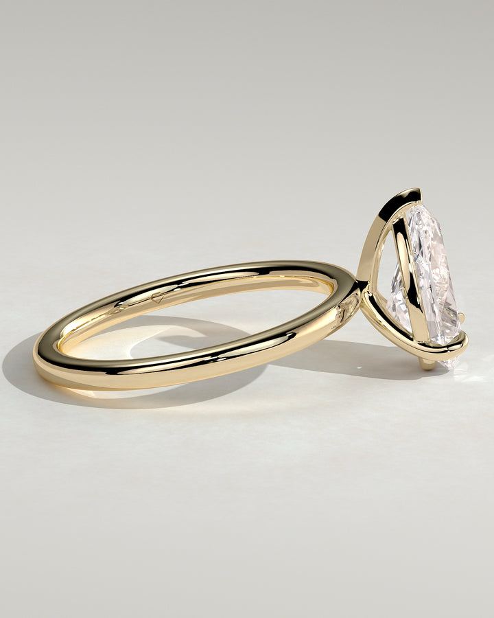 pear solitaire engagement ring gold band