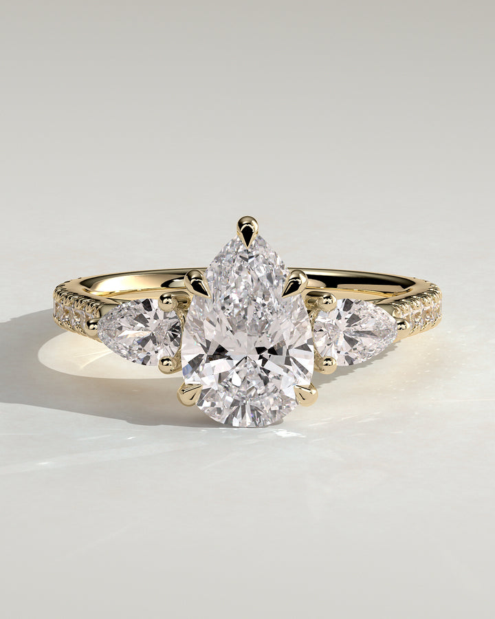 pear trilogy engagement ring