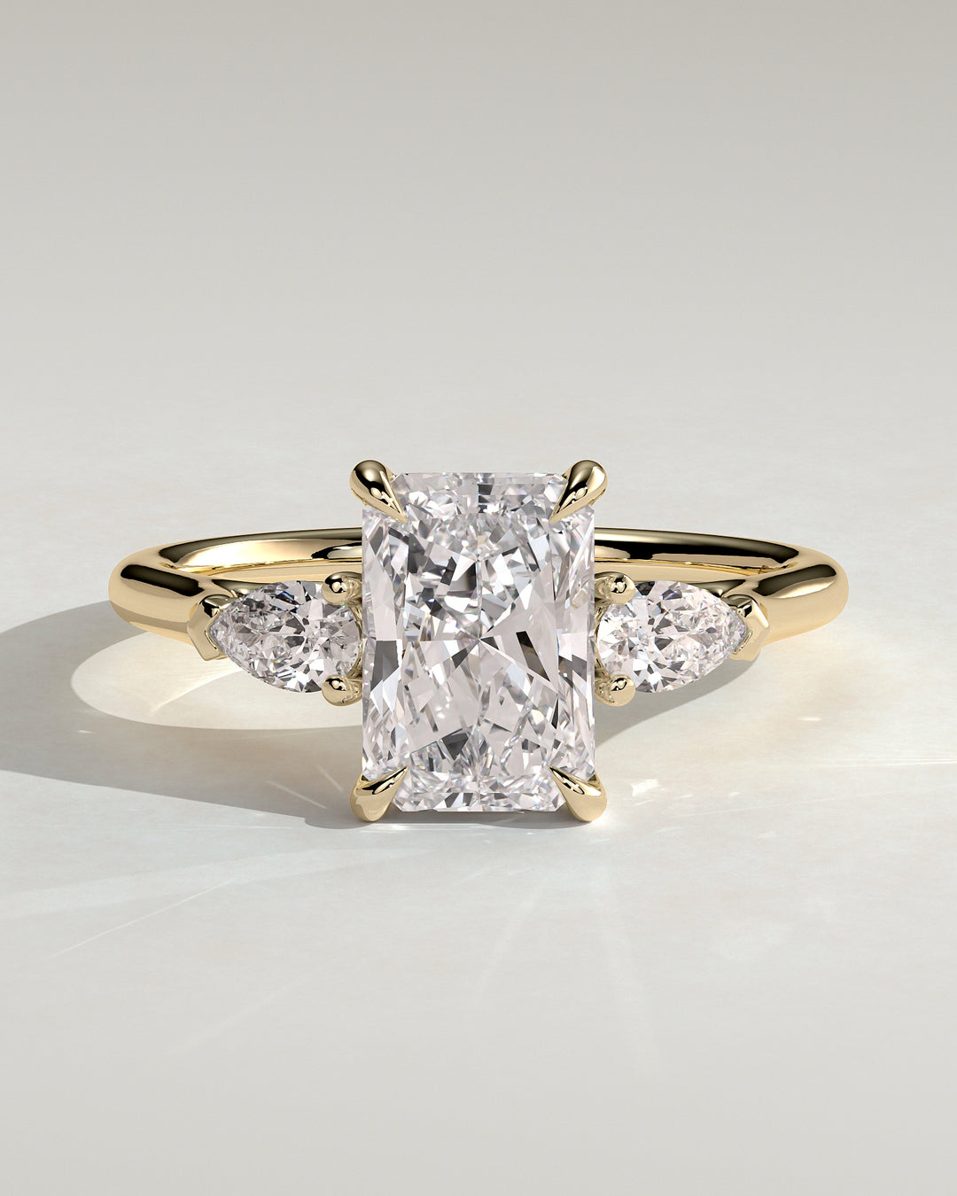 radiant trilogy engagement ring