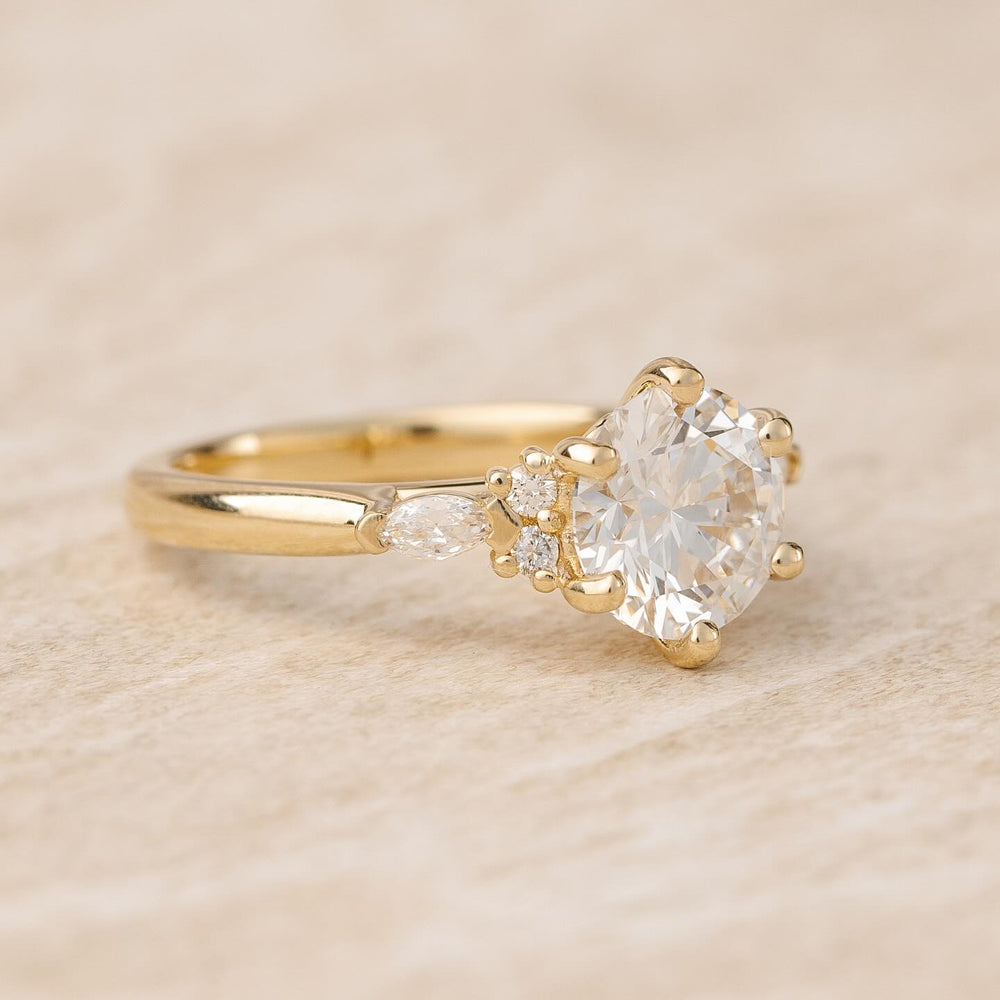round cluster engagement ring
