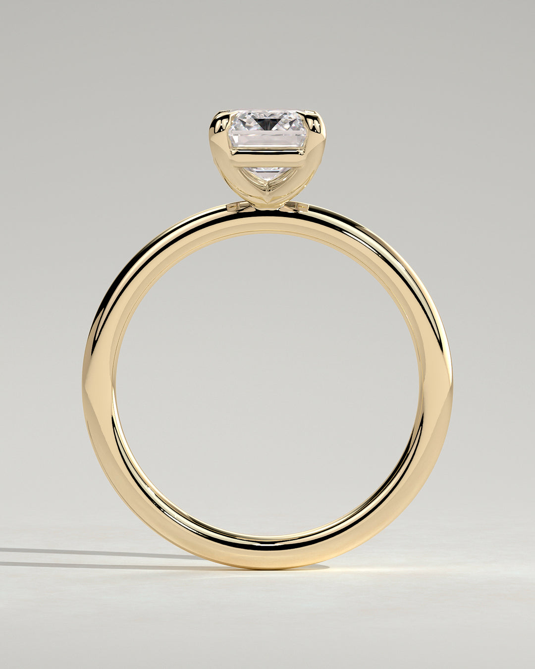 solitaire emerald cut ring,