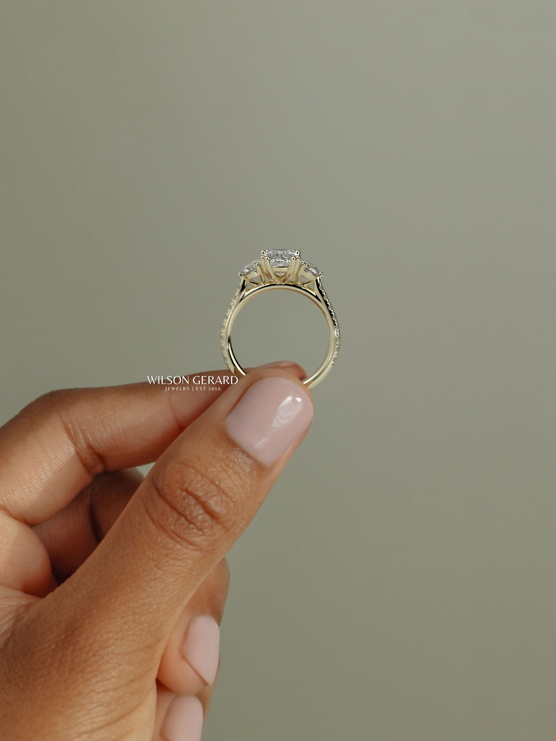 three stone cushion cut diamond ring
